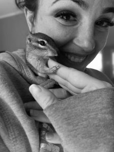 photo of vet assistant with small animal